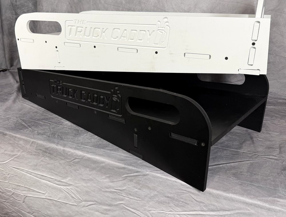 Actual Black and White Truck Caddy holders with the new physical logo